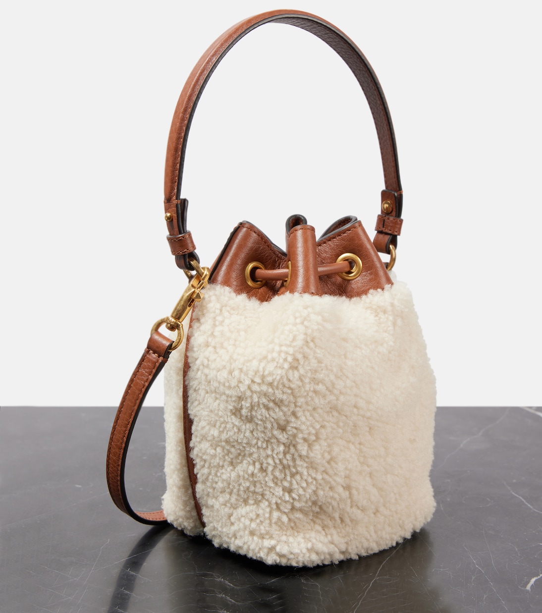 VLogo Signature shearling bucket bag | Valentino Garavani