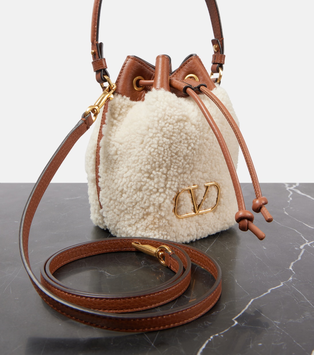 VLogo Signature shearling bucket bag | Valentino Garavani