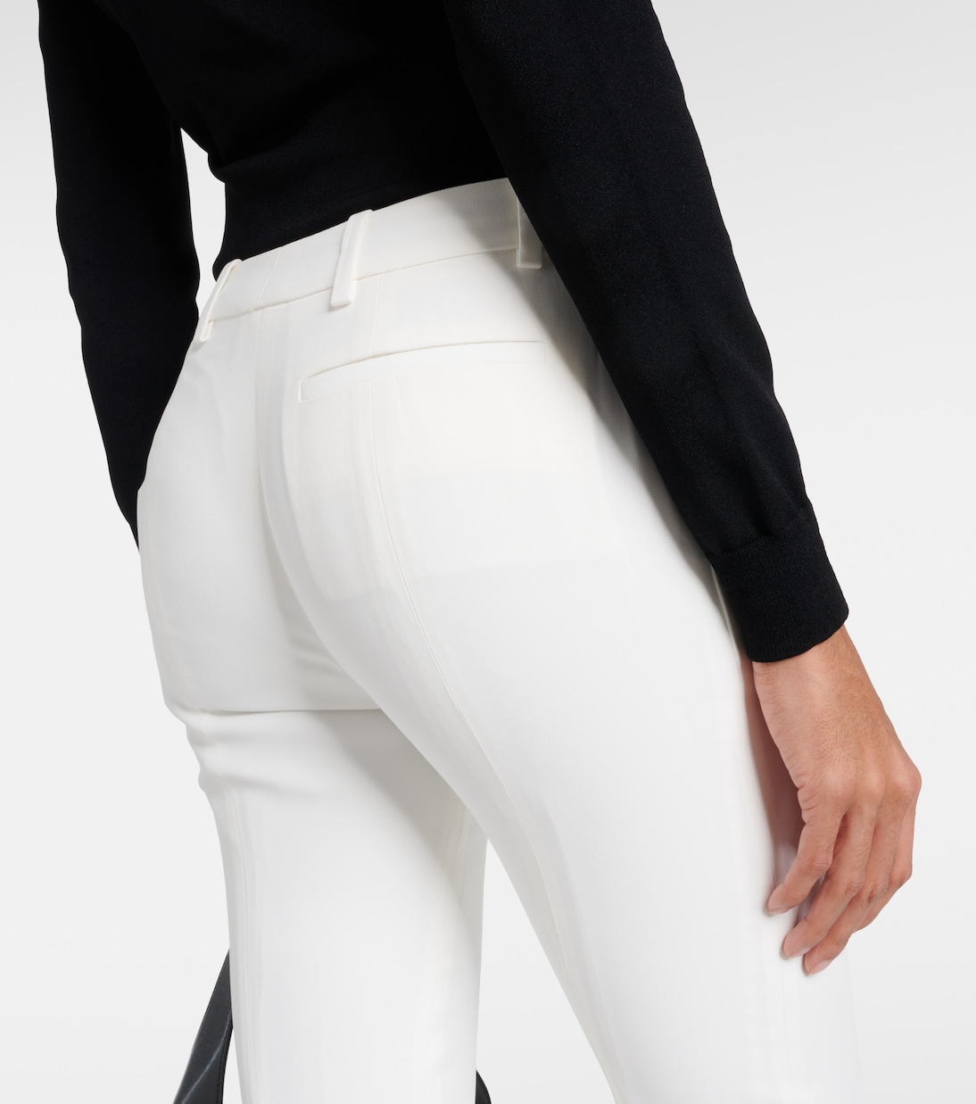 Mid-rise flared pants in white - Mc Queen | Mytheresa
