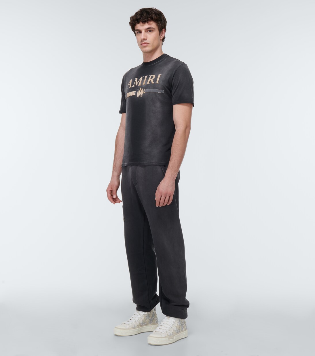 Logo cotton sweatpants in black - Amiri | Mytheresa