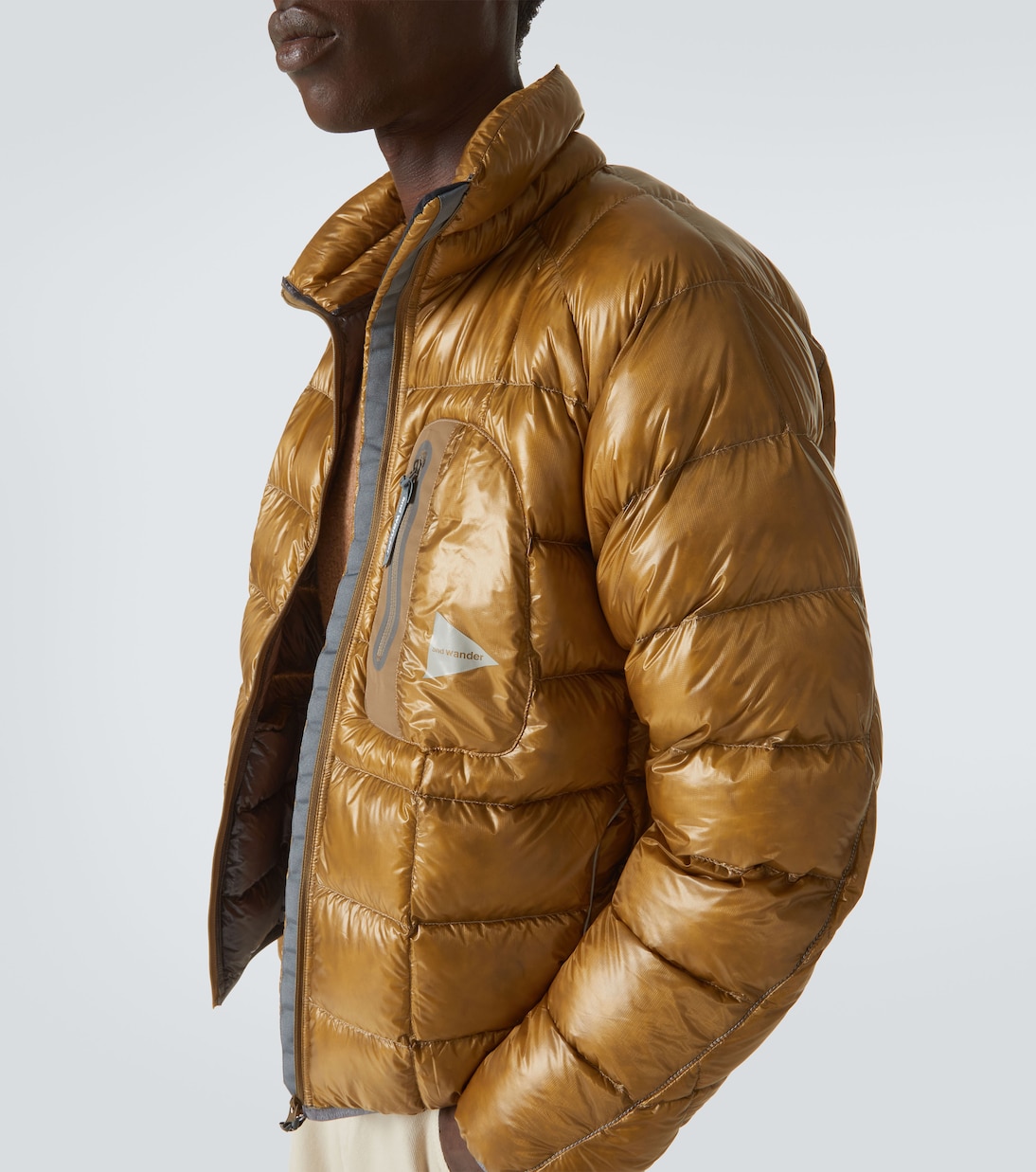 Chaqueta de plumas con paneles | And Wander