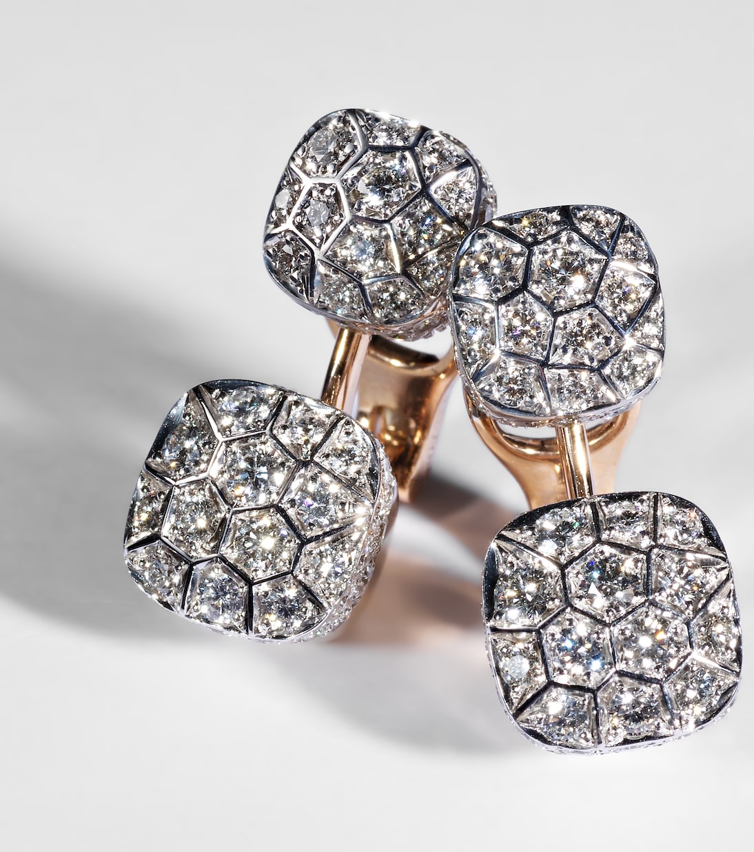 Boucles d'oreilles Nudo en or rose et blanc 18 ct et diamants | Pomellato