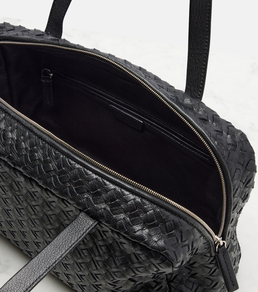 Astra woven leather shoulder bag | The Row