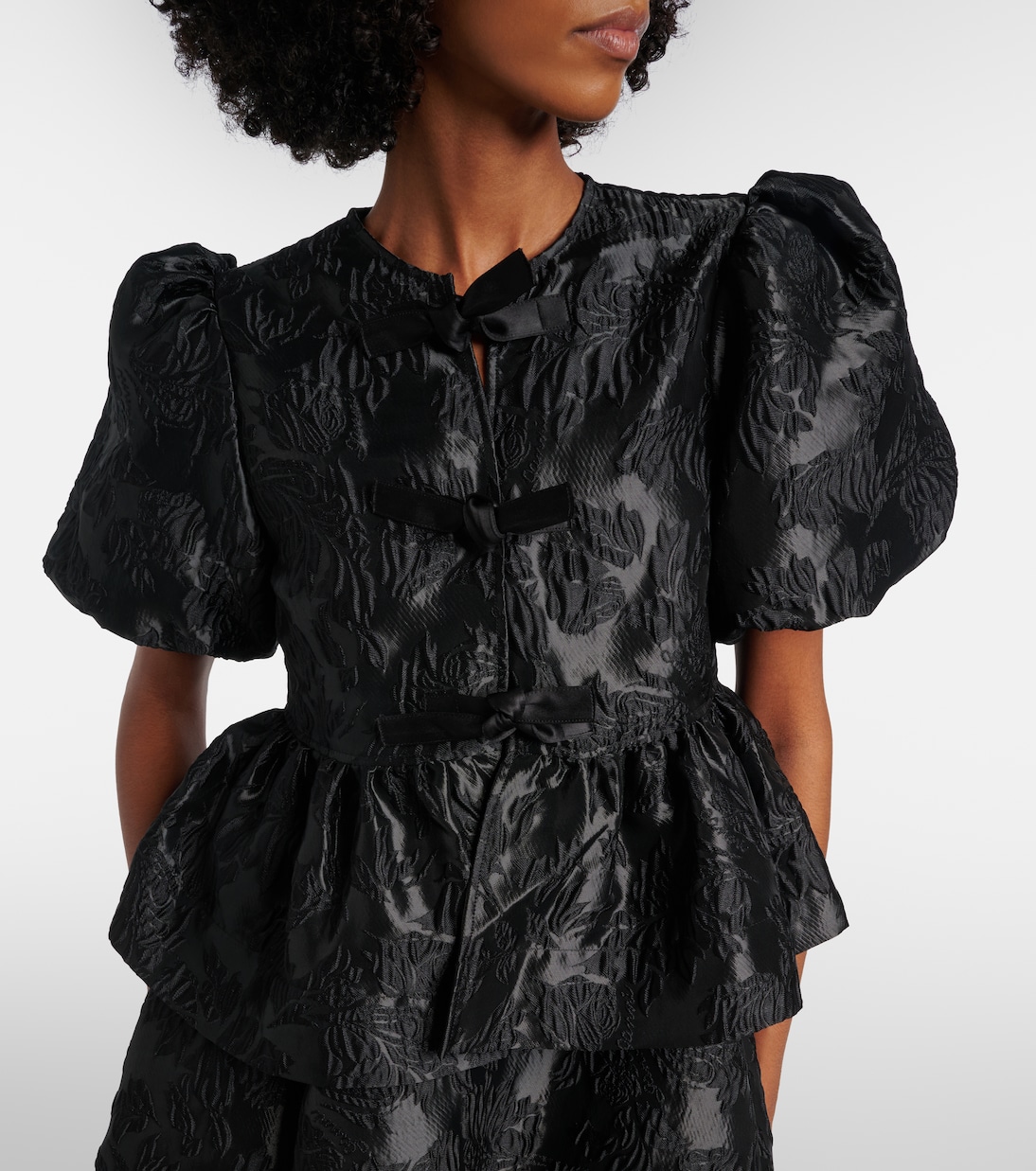 Bow-detail floral peplum satin blouse | Ganni