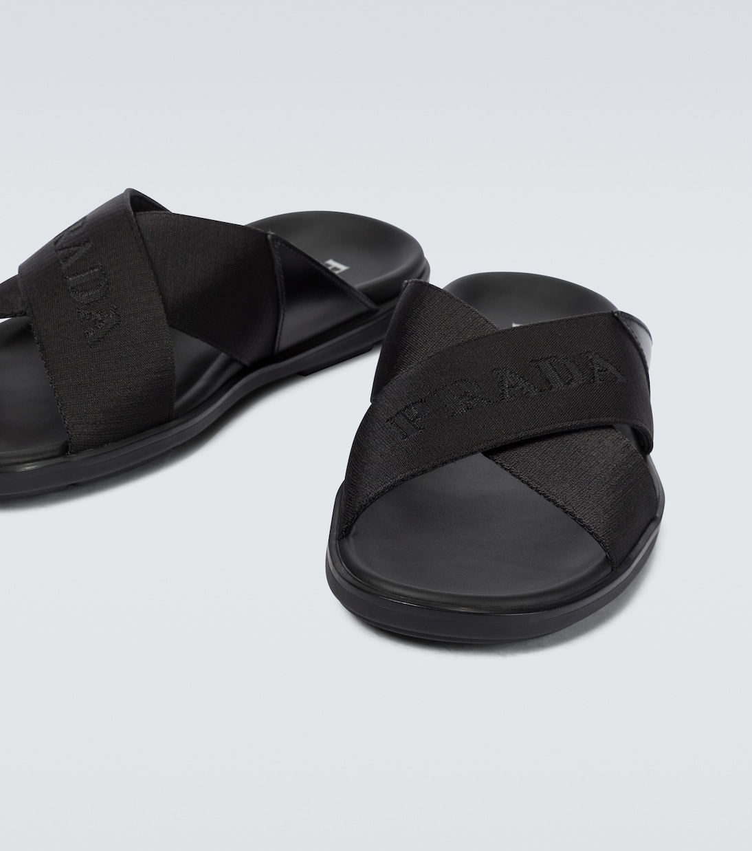 Criss-cross logo slides | Prada