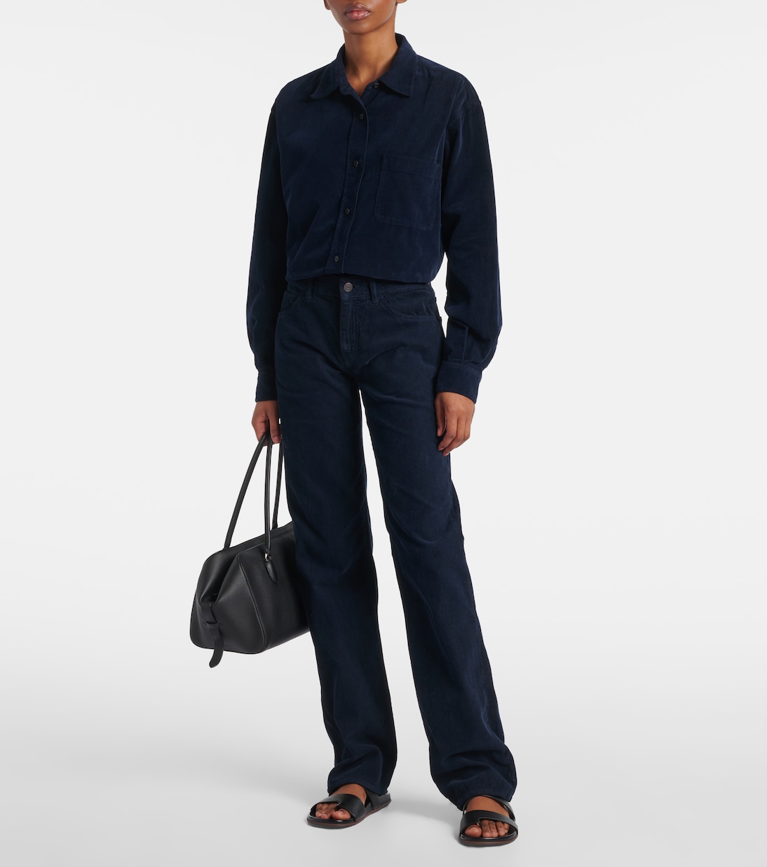 Pantaloni slim Carlyl in velluto di cotone a coste | The Row