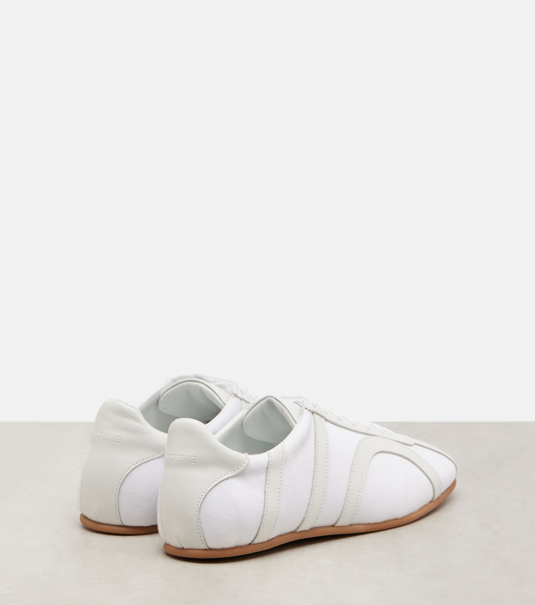 Leather-trimmed sneakers | Toteme