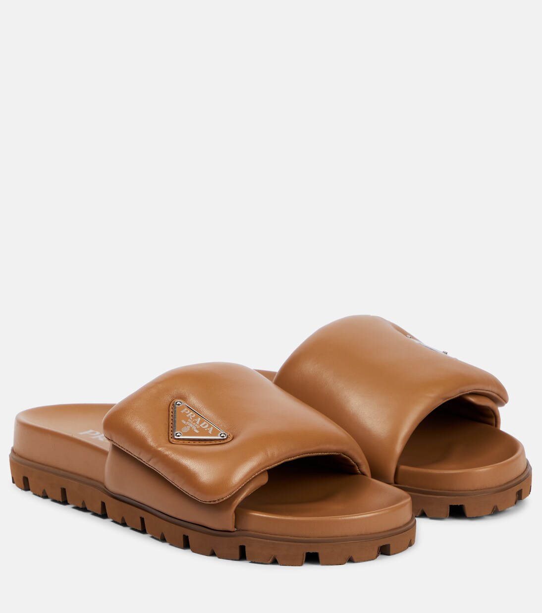 Padded nappa leather sandals in brown - Prada | Mytheresa