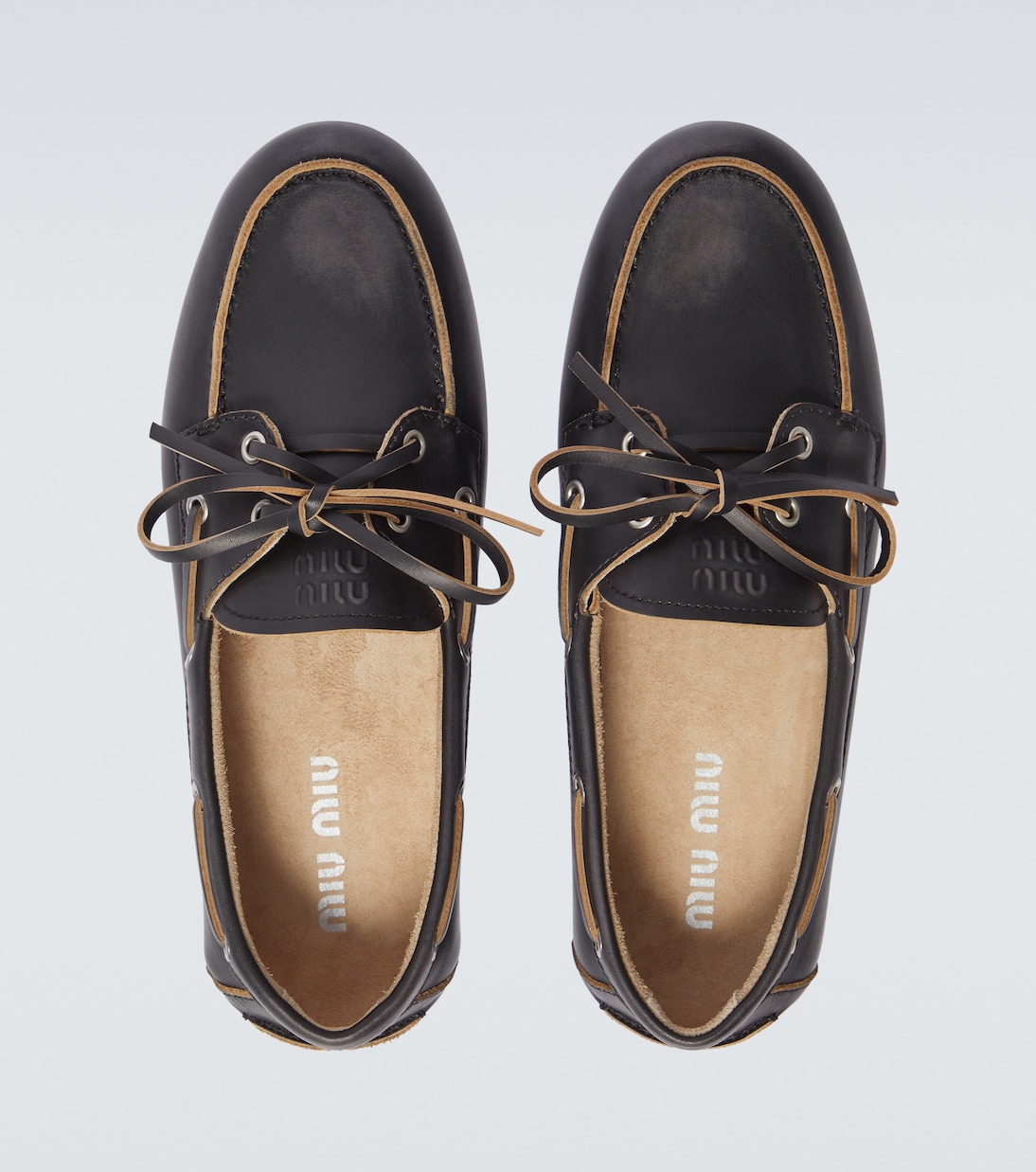 Logo leather boat shoes | Miu Miu