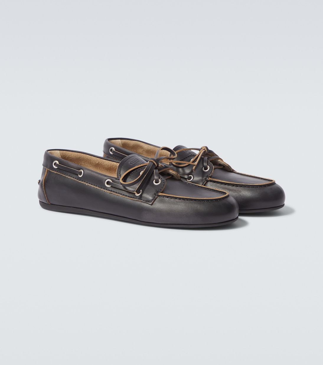 Logo leather boat shoes | Miu Miu