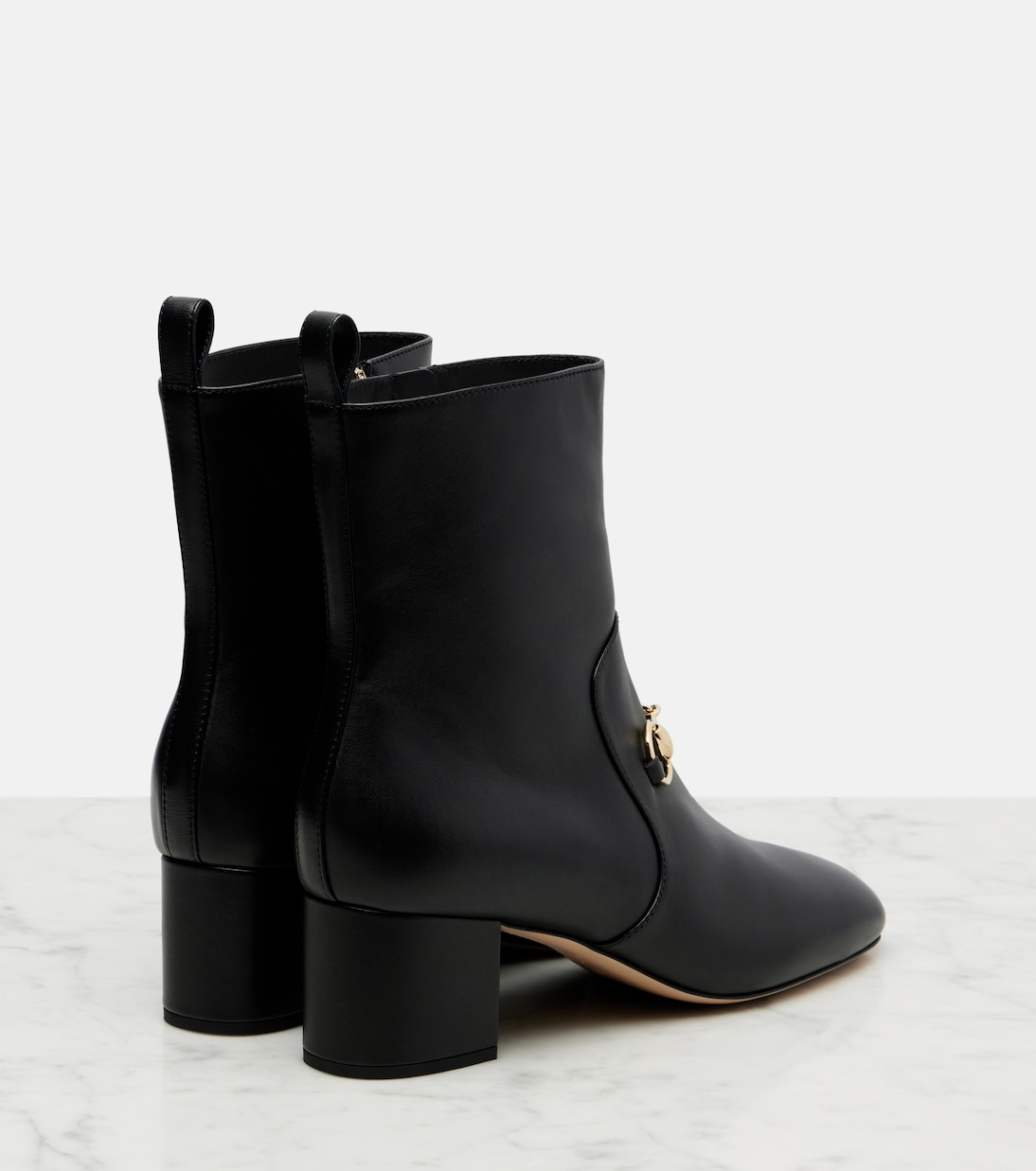 Horsebit leather ankle boots | Gucci