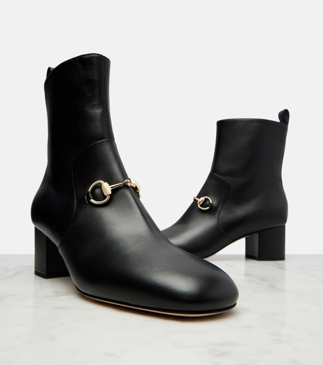 Horsebit leather ankle boots | Gucci