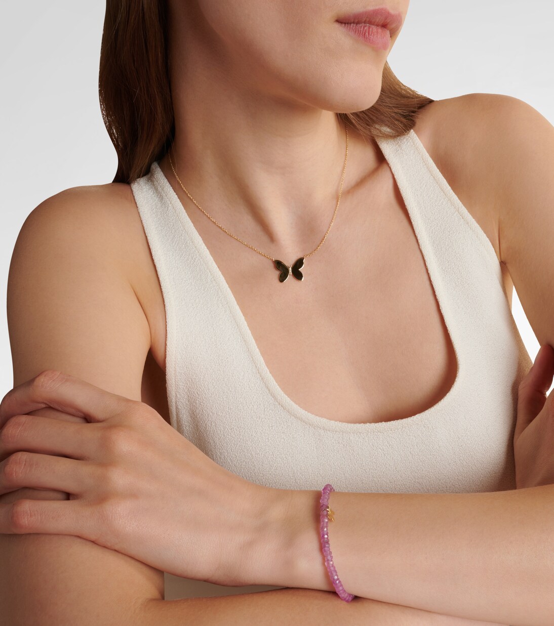 Braccialetto Giovane in Oro 14kt con Farfallina e Perline - Stile Unico per Ragazze Moderne