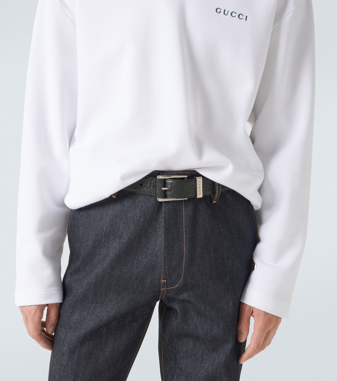GG debossed leather belt | Gucci