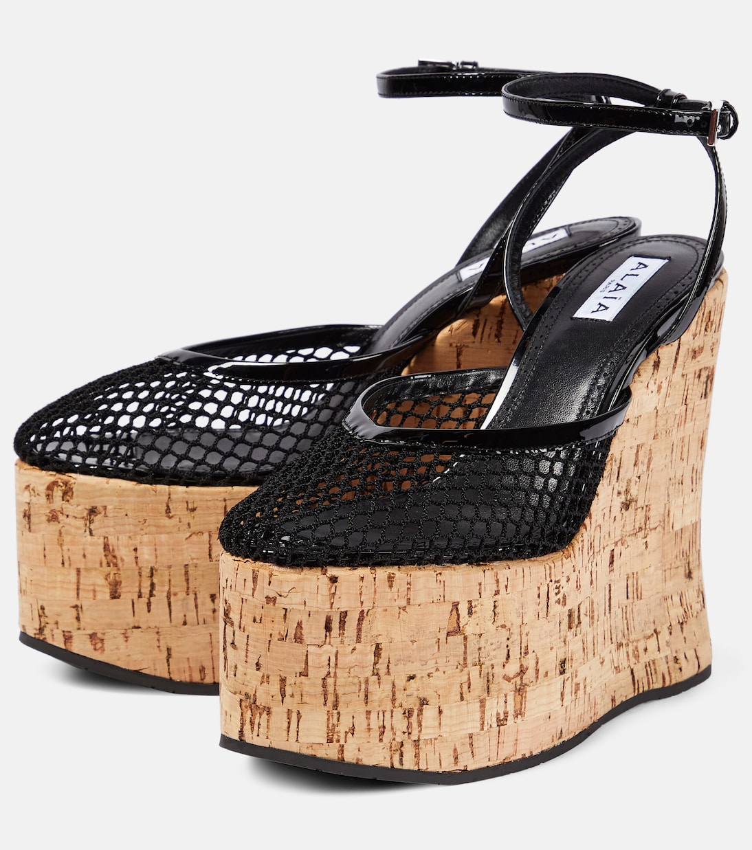 Patent leather and mesh wedge sandals | Alaïa