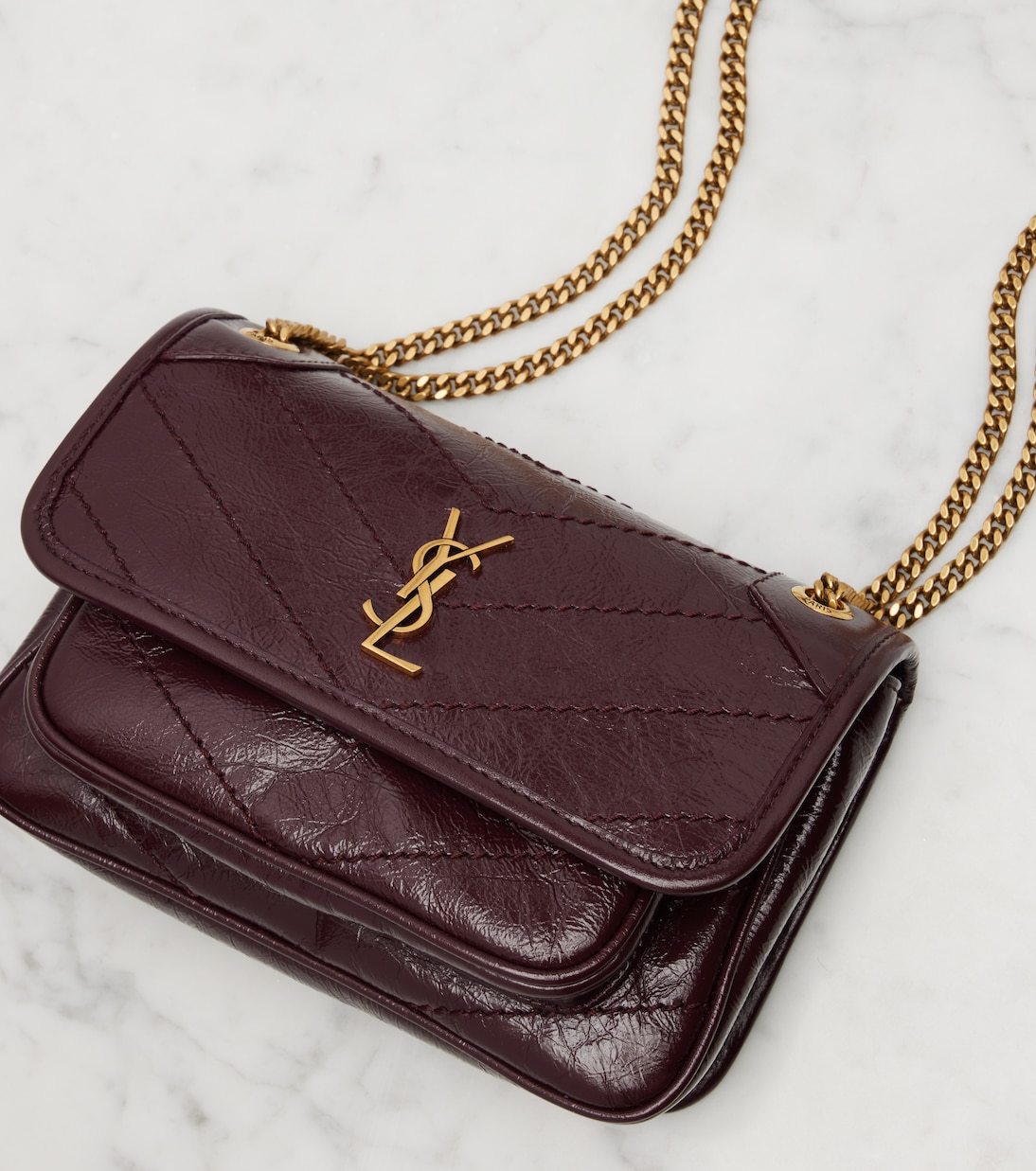 Niki Cassandre Mini leather shoulder bag | Saint Laurent