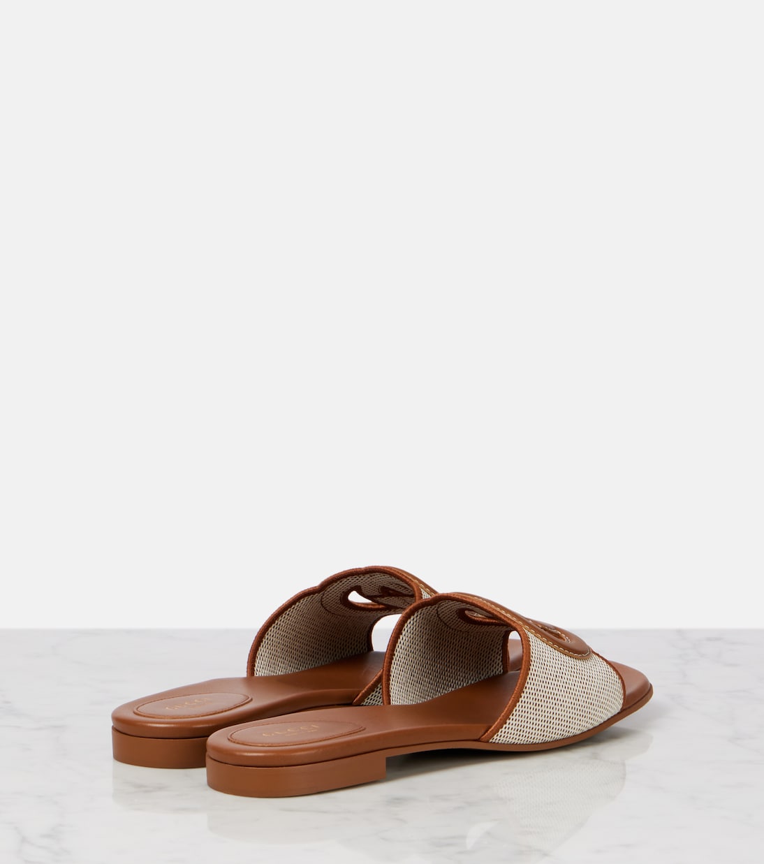 Pantoletten Interlocking G mit Leder | Gucci