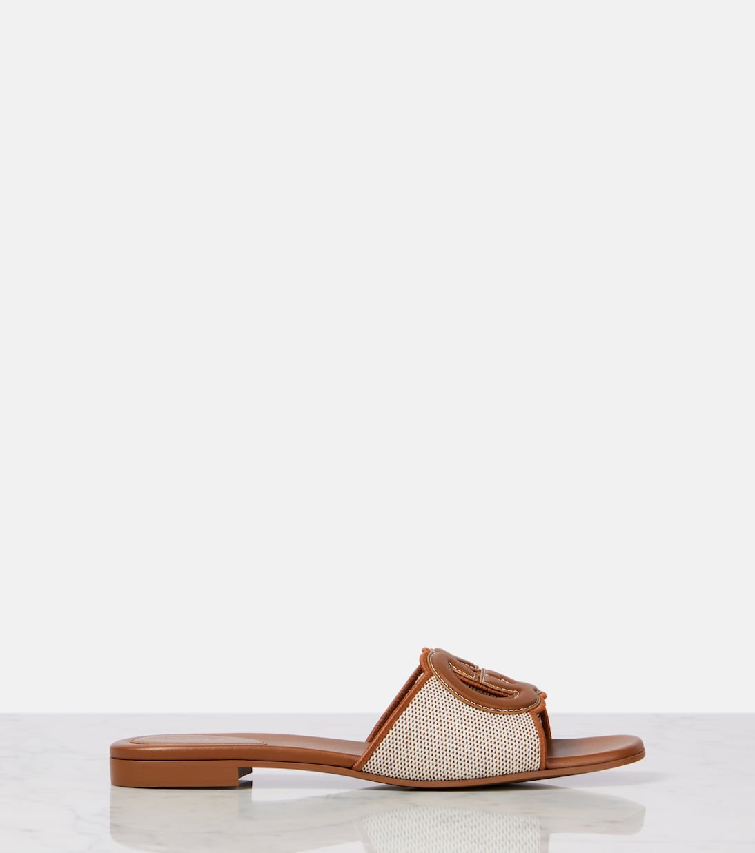 Pantoletten Interlocking G mit Leder | Gucci