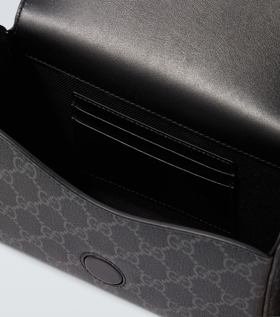 GG Supreme leather-trimmed canvas crossbody bag | Gucci