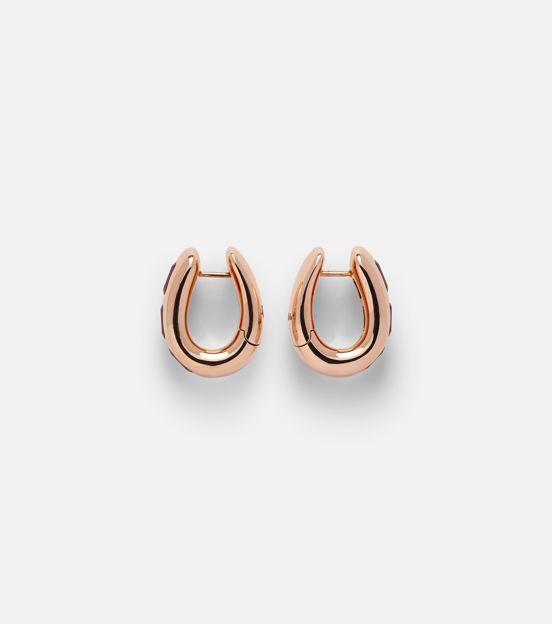 Orecchini Iconica Pomellato in oro rosa 18kt con granati piropo, gioielli chic per giovani trendy