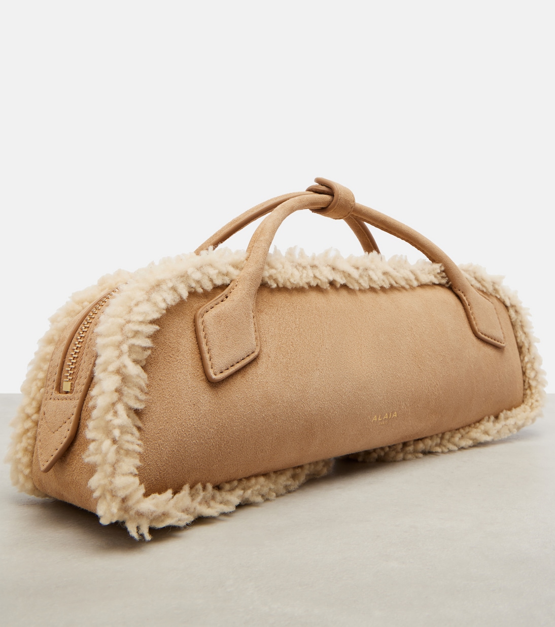 Le Teckel suede clutch | Alaïa