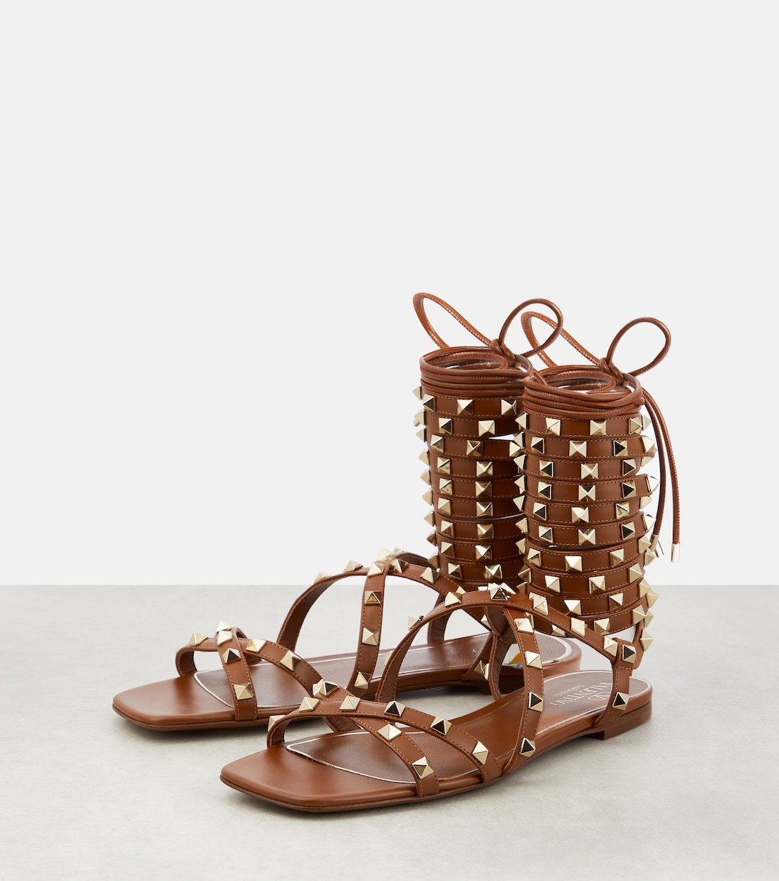 Rockstud leather wrap-around sandals | Valentino Garavani