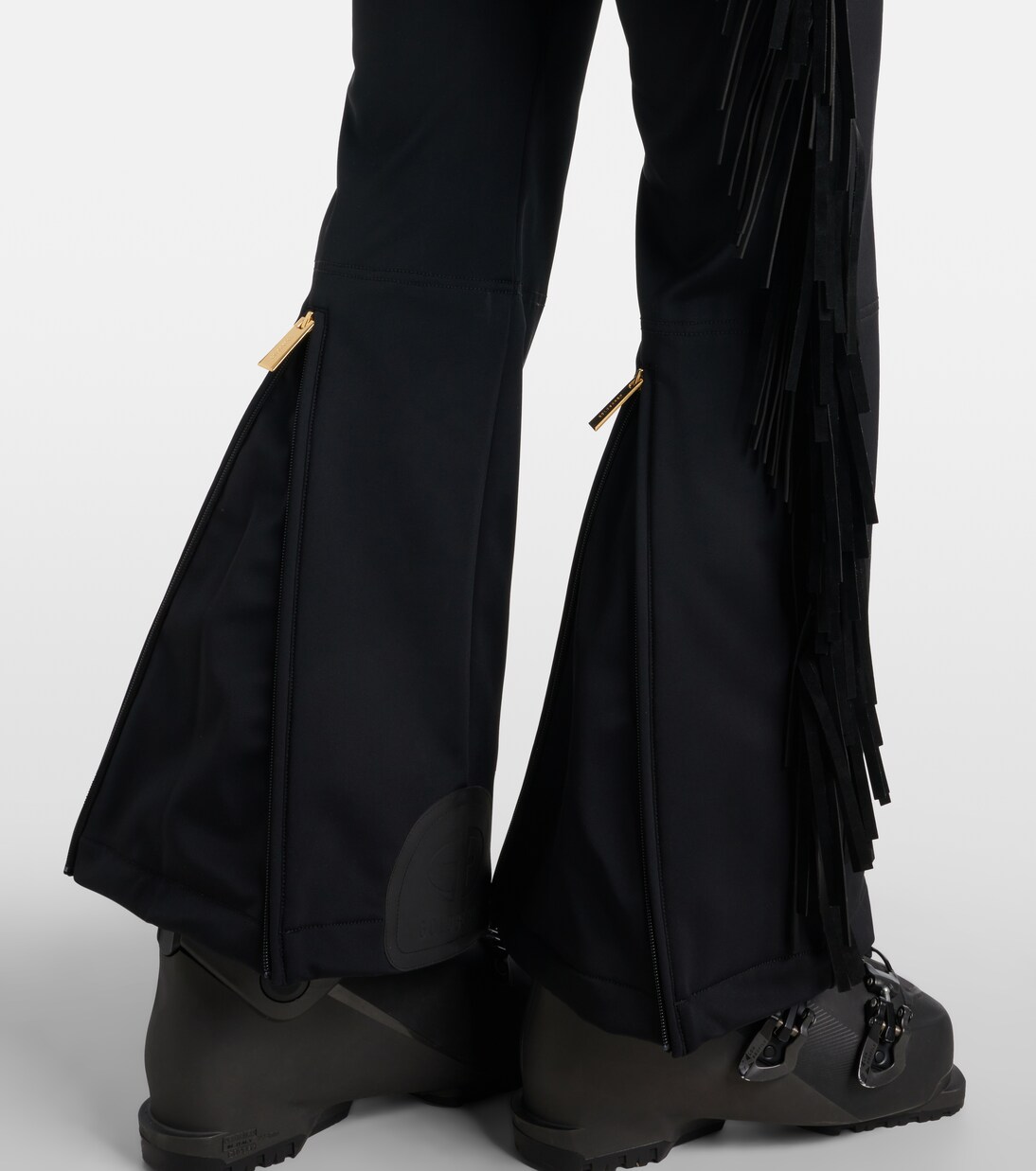 Cowboy fringed ski salopettes | Goldbergh