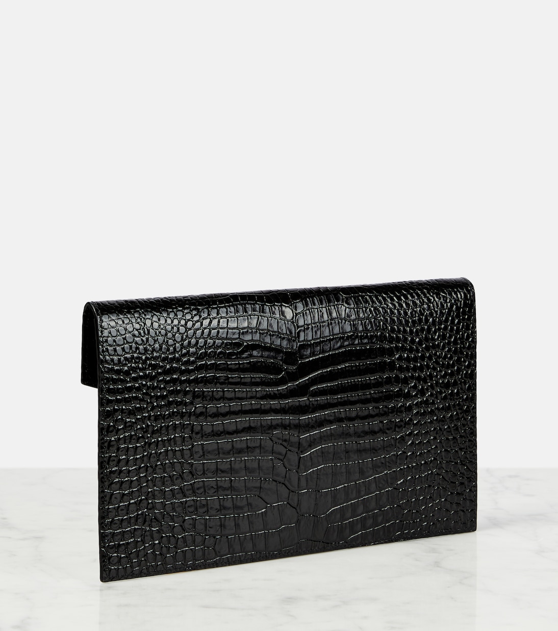 Uptown patent leather clutch in black Saint Laurent Mytheresa