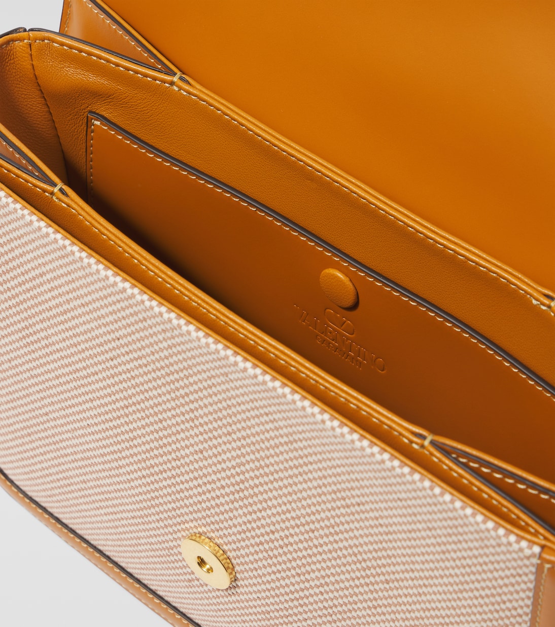 9TO5 leather-trimmed canvas shoulder bag | Valentino Garavani