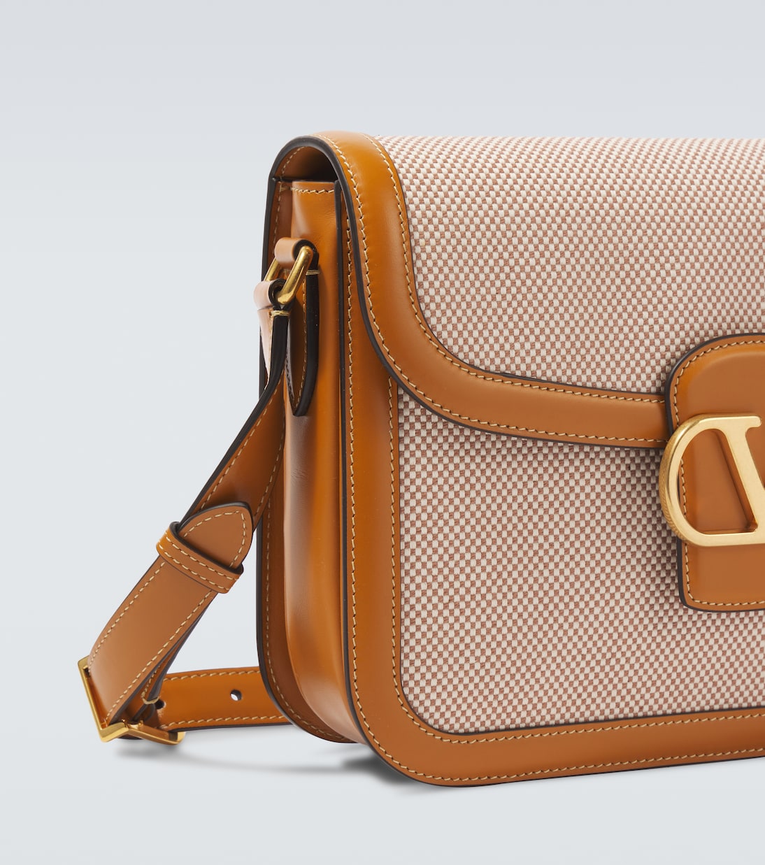 9TO5 leather-trimmed canvas shoulder bag | Valentino Garavani