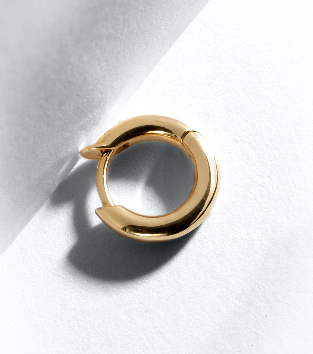 Boucle d'oreille unique Micro Hoop Mini en or 18 ct | Spinelli Kilcollin