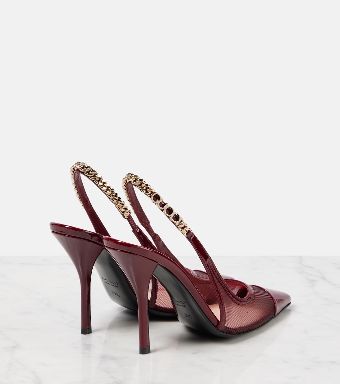 Stivaletti GUCCI Signoria con dettaglio a rete e tacco, perfetti per uno stile giovane e audace.