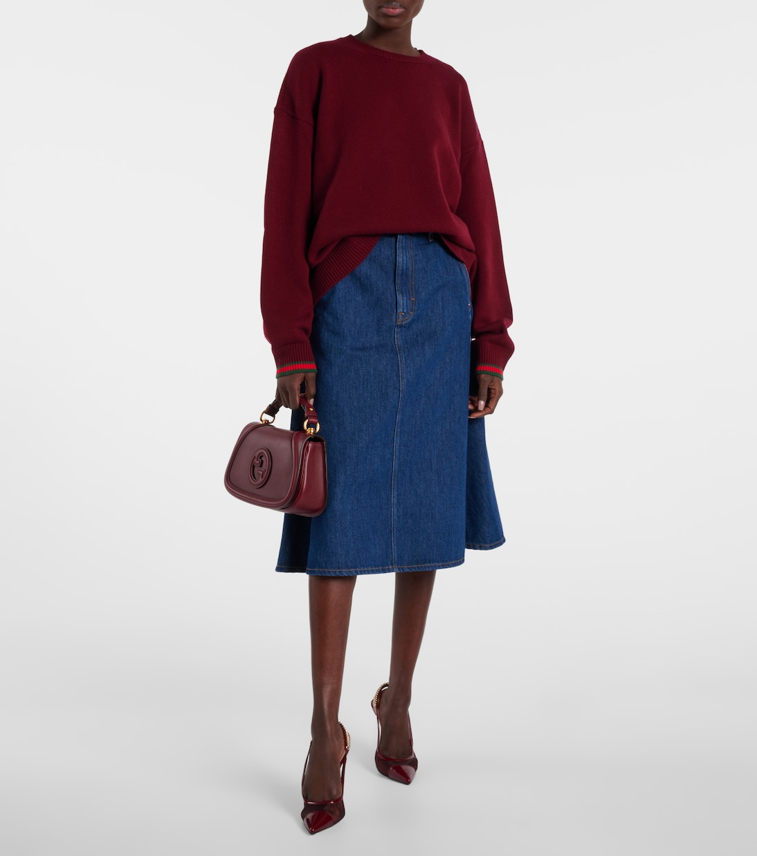 Stivaletti GUCCI Signoria con dettaglio a rete e tacco, perfetti per uno stile giovane e audace.