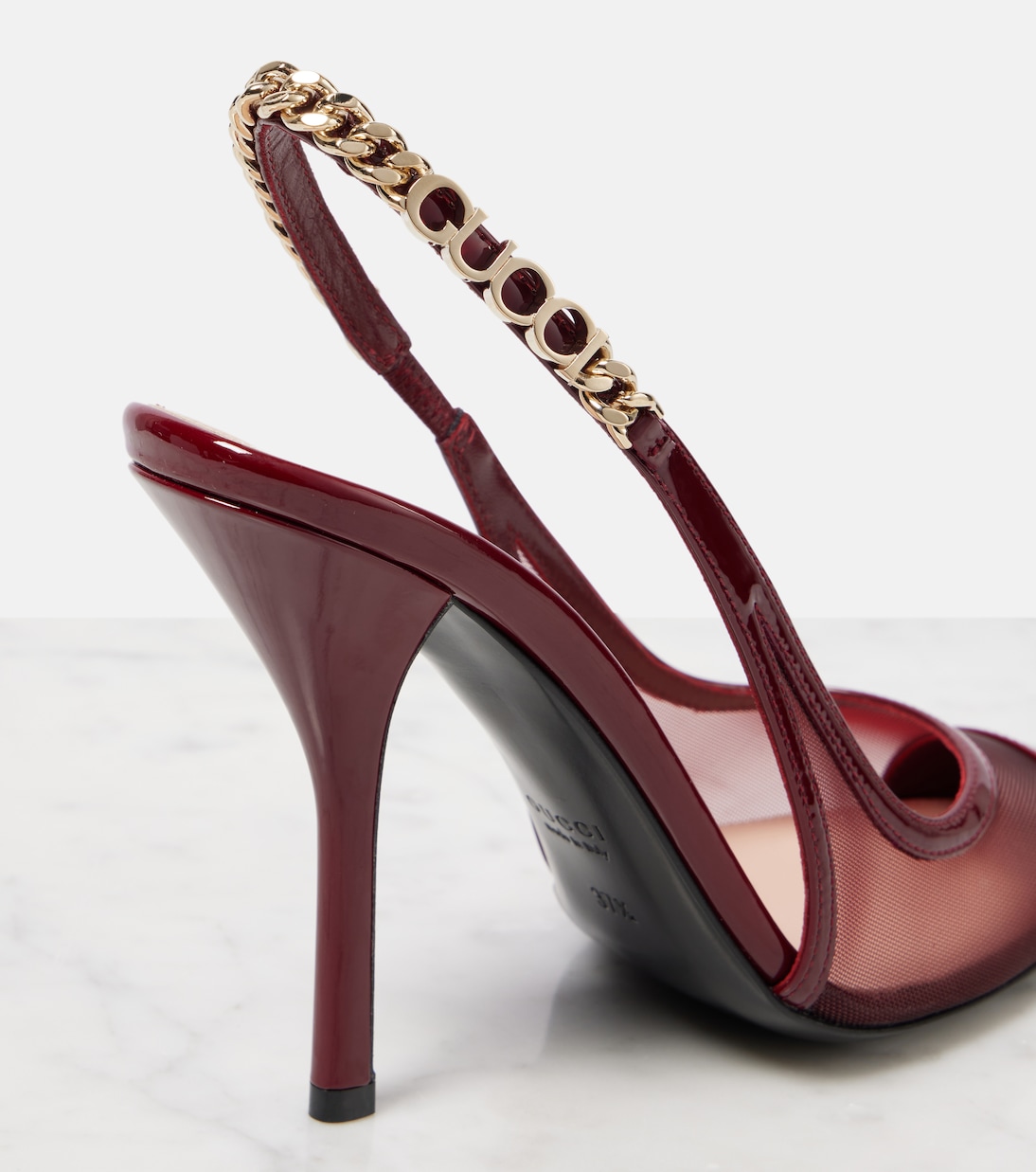 Stivaletti GUCCI Signoria con dettaglio a rete e tacco, perfetti per uno stile giovane e audace.