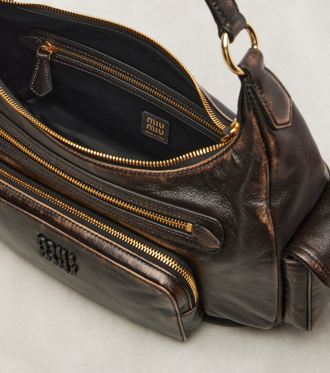 Distressed leather shoulder bag | Miu Miu
