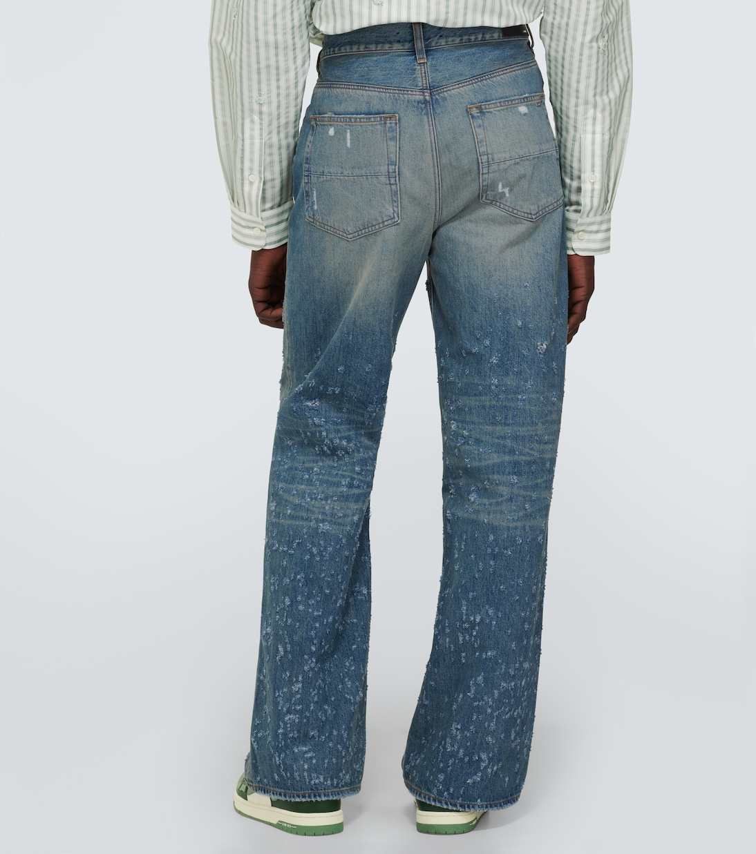 Shotgun distressed wide-leg jeans | Amiri