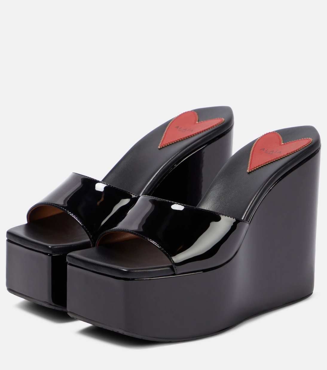 Patent leather platform wedge mules | Alaïa
