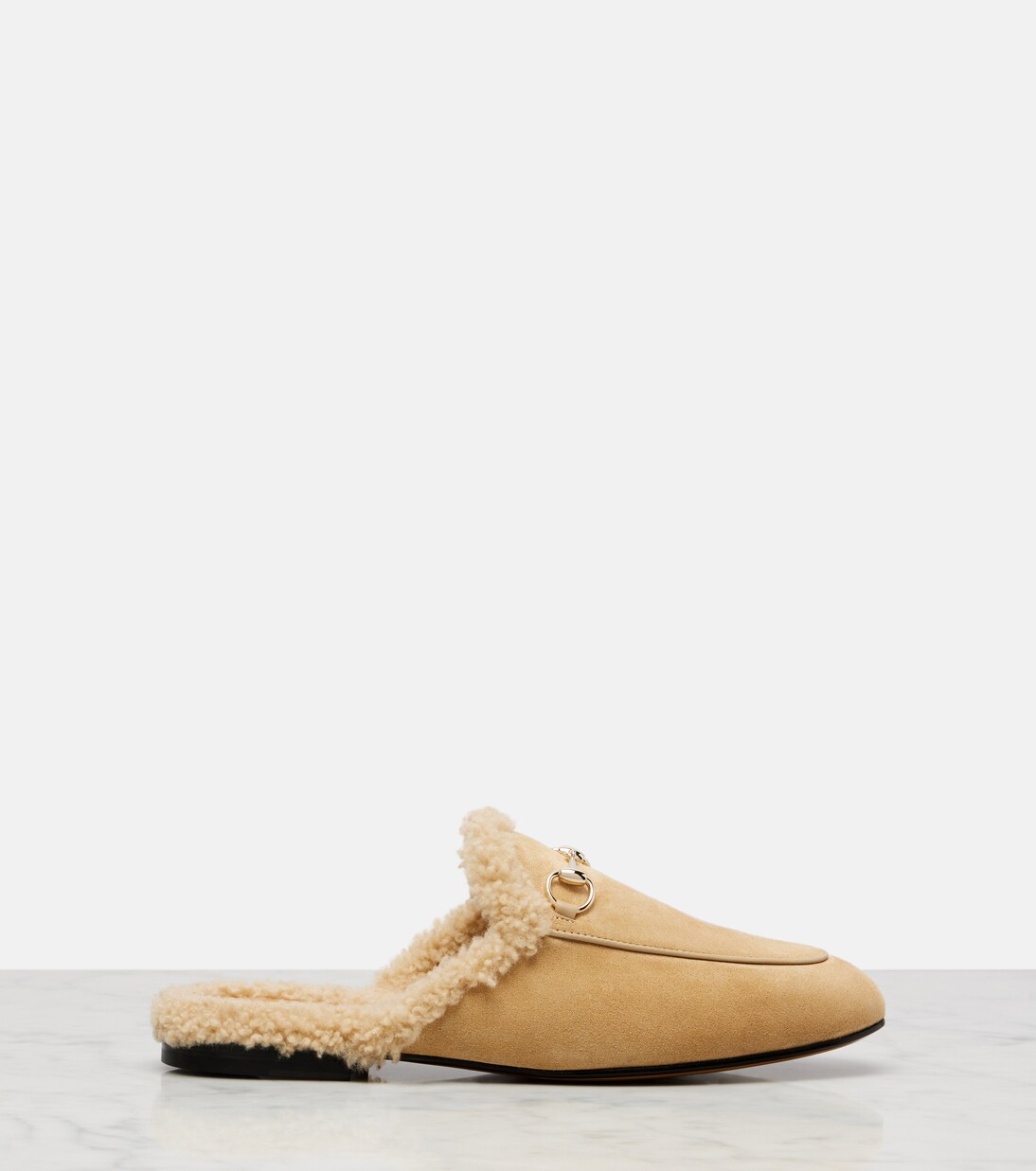 Mules in suede con shearling | Gucci