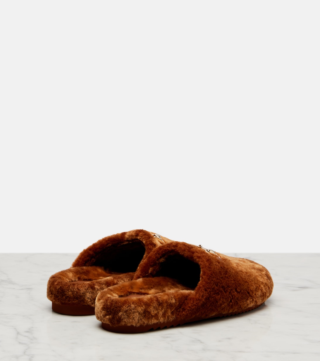 Mules Sol Horsebit en shearling | Gucci