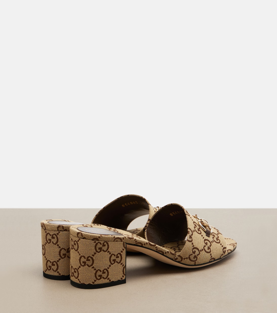 Horsebit GG Canvas mules | Gucci