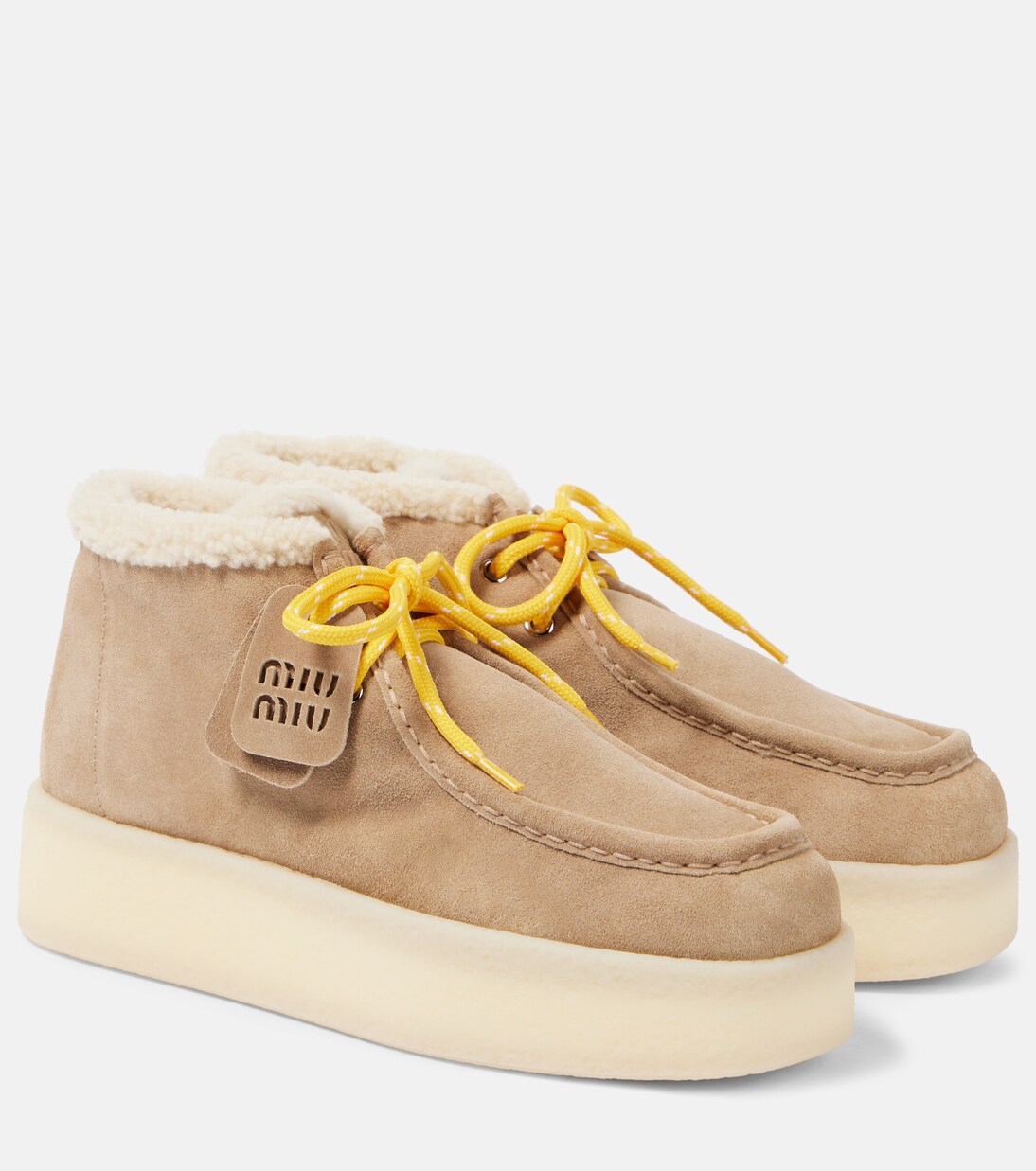 Shearling lined leather platform ankle boots in beige Miu Miu Mytheresa