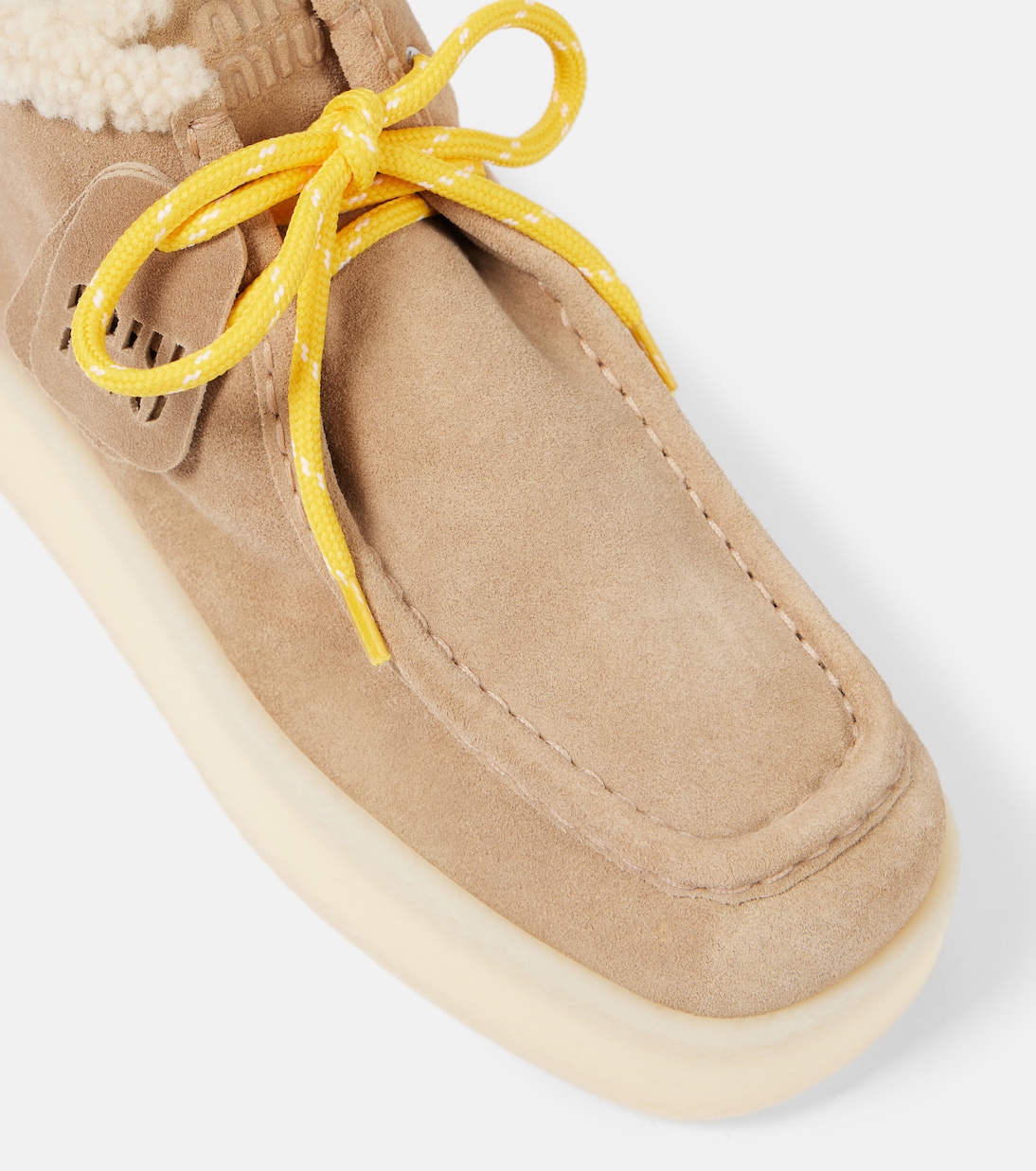 Shearling-lined leather platform ankle boots | Miu Miu