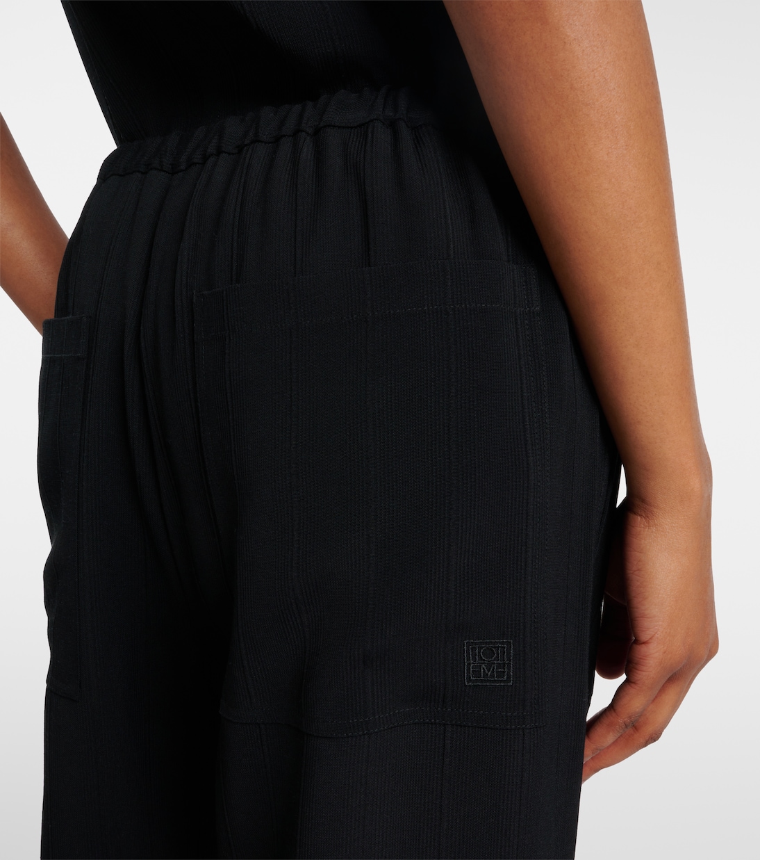 Pantaloni a gamba larga a righe | Toteme