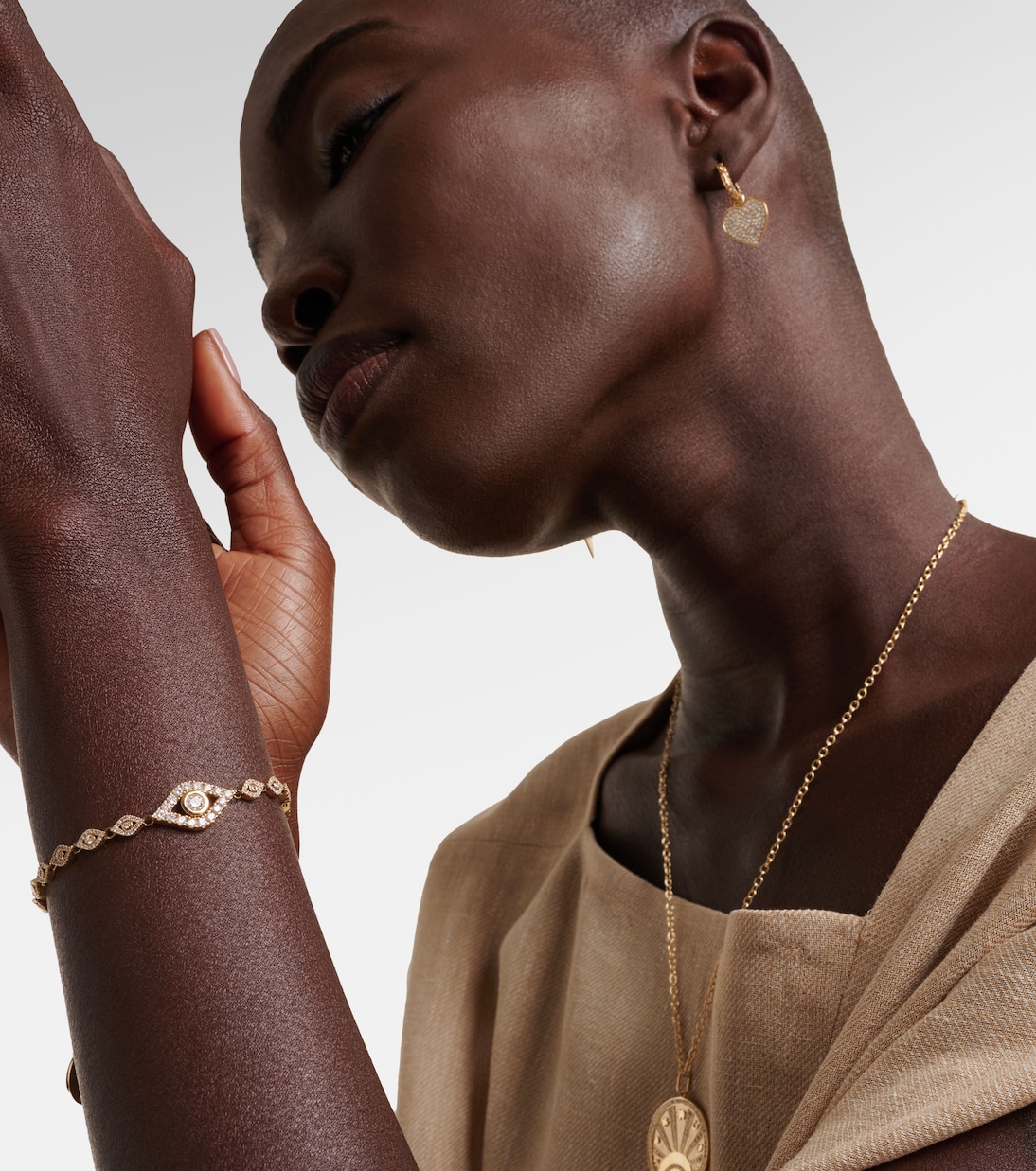 Bracciale in oro giallo 14kt con occhio malocchio e diamanti, design moderno per giovani