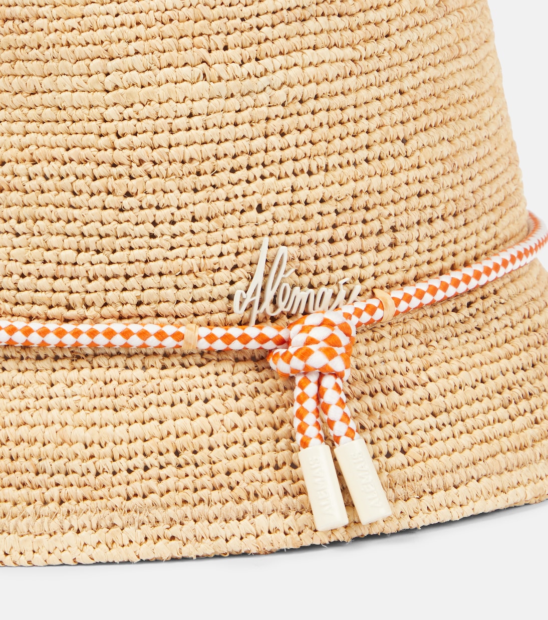 Cappello a secchiello in rafia all'uncinetto ALÉMAIS - Tocco di sole per il tuo stile giovane
