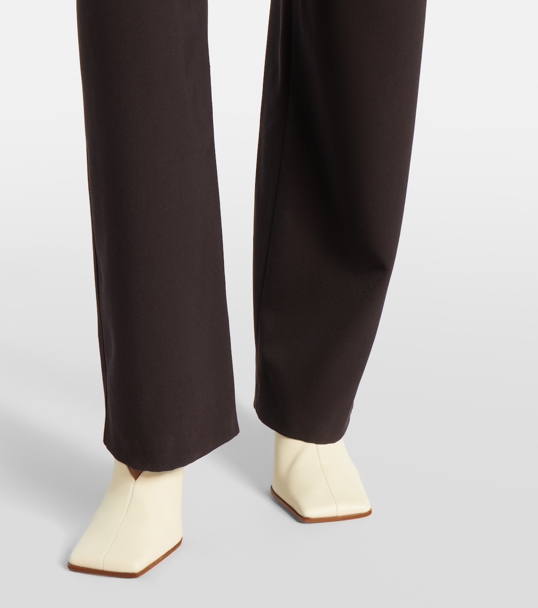 Leather-trimmed wool straight pants | Alaïa