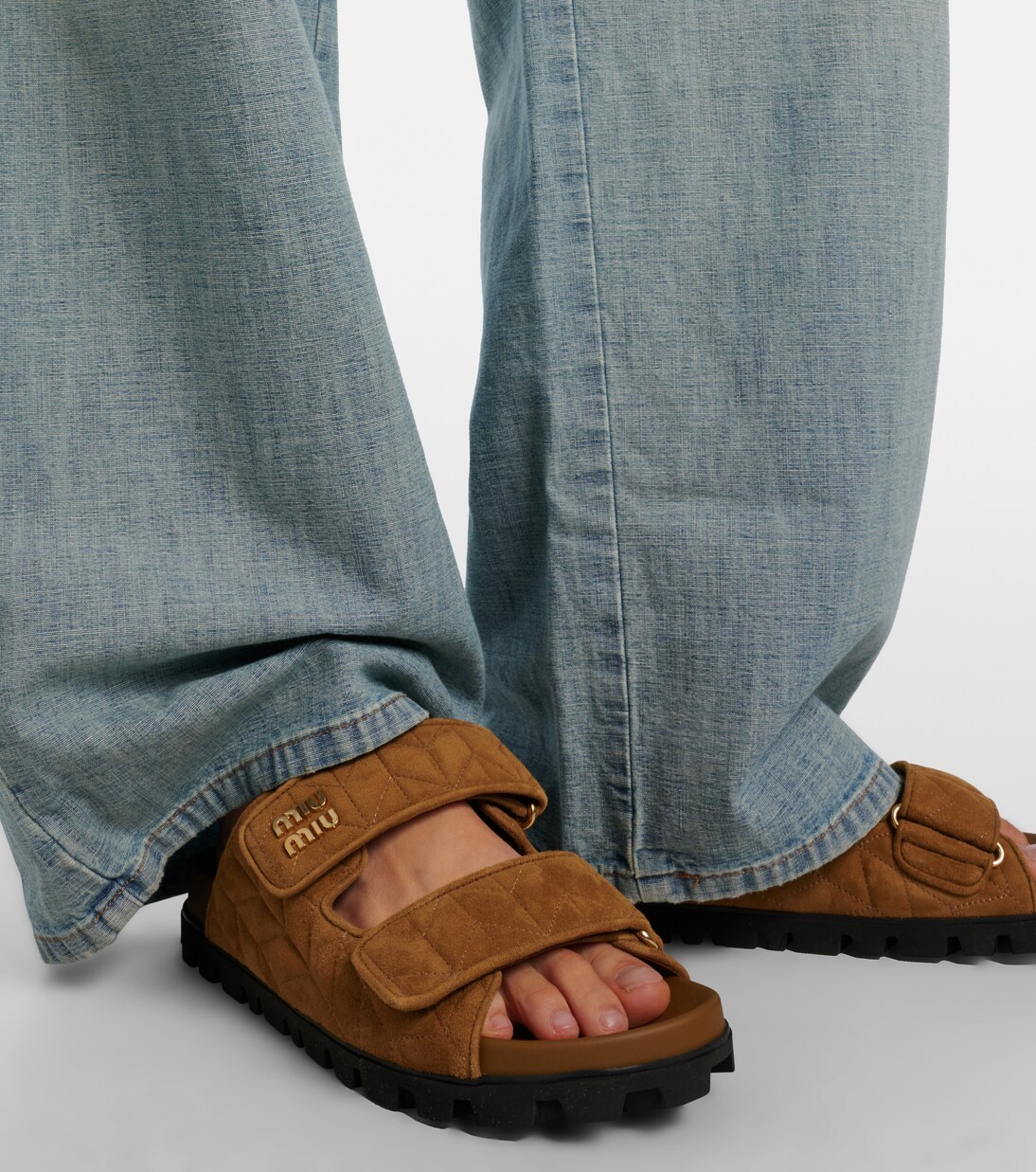 Quilted suede slides | Miu Miu