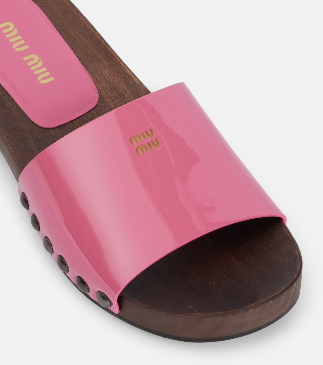 Patent leather clogs | Miu Miu