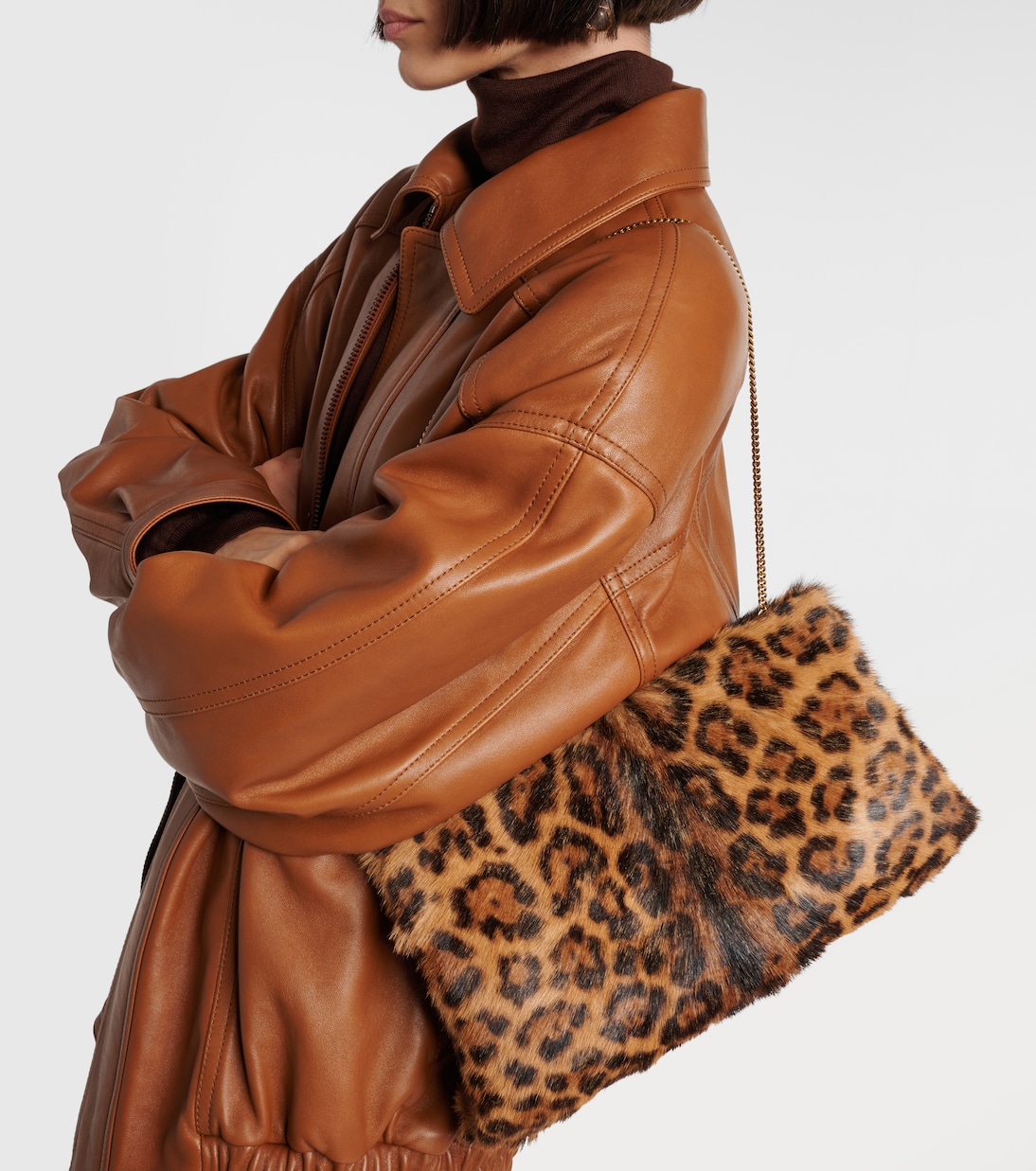 Leopard-print calf hair clutch | Saint Laurent