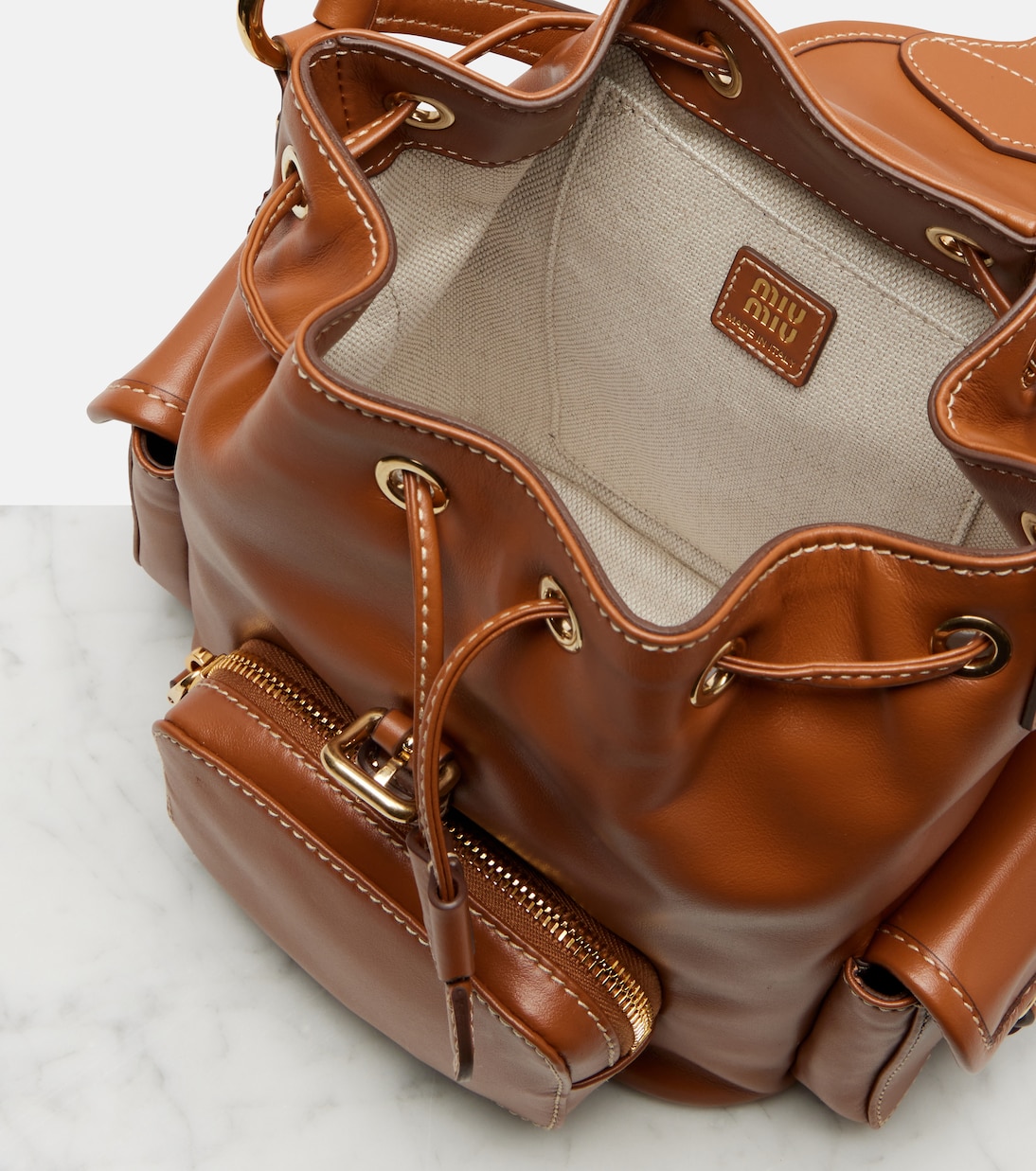 Logo leather backpack | Miu Miu